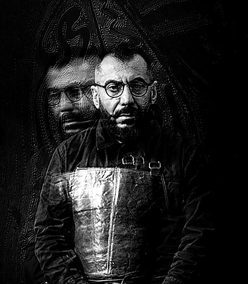 Portrait of Arman Nur, layered in double exposure against a dark, patterned backdrop, wearing a leather apron.
